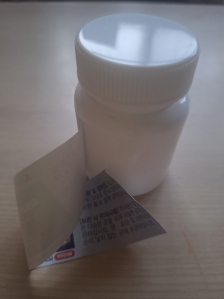 약병 라벨제거 후 분리배출 